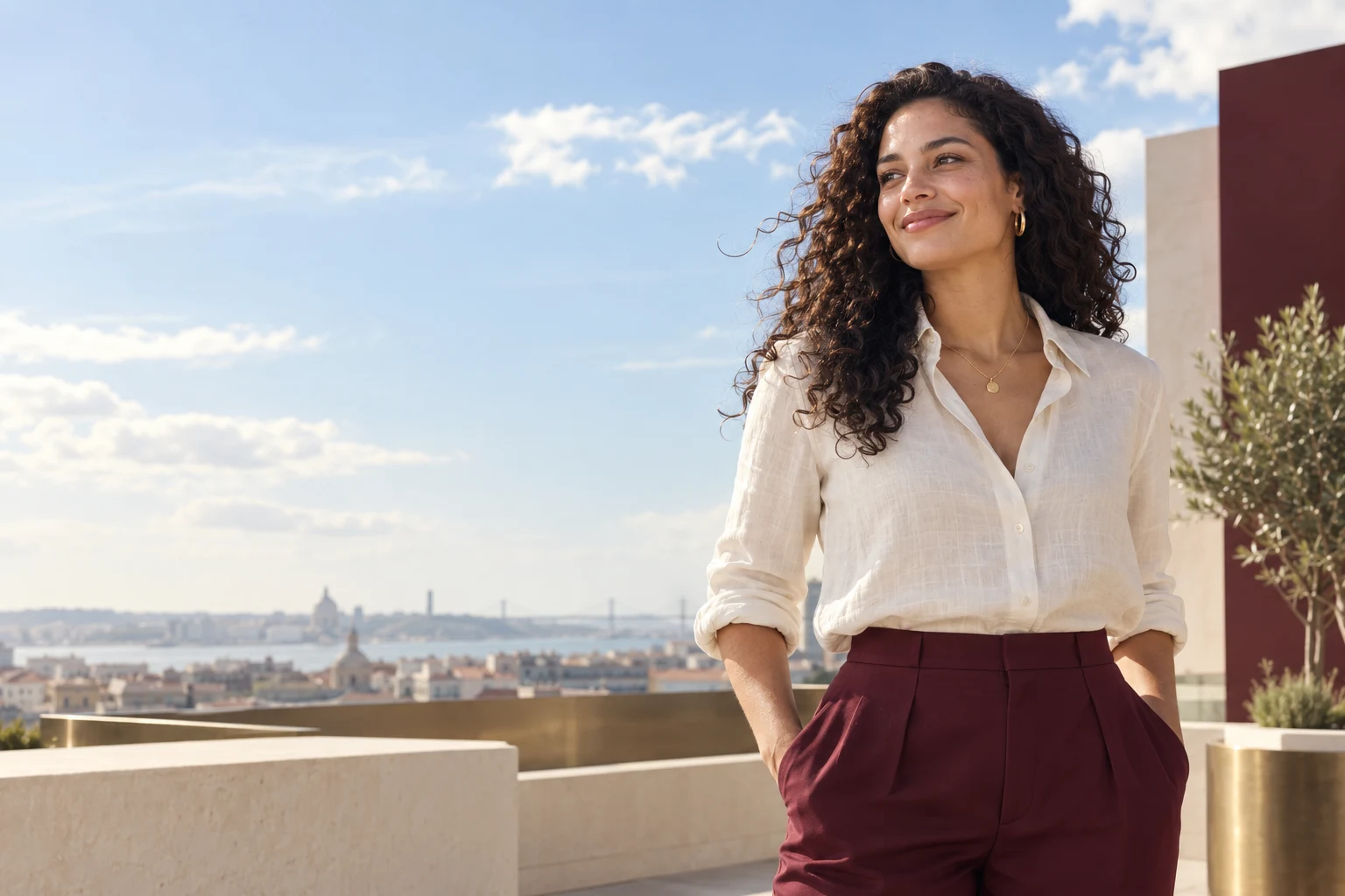Woman in a light shirt on a sunny terrace